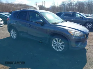 2013 Mazda CX-5 Grand Touring with VIN JM3KE4DE1D0164488, listed as a IAAI auction lot 41683326 with 129,989 mi miles. Bid and sale history available at carsss.com. Image 1.