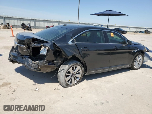 2011 Ford Taurus Limited with VIN 1FAHP2FW4BG107266, listed as a Copart auction lot 56921495 with Not provided miles and Salvage title. Bid and sale history available at DreamBid. Image 3.