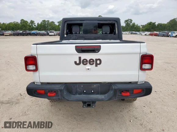 2023 Jeep Gladiator Rubicon with VIN 1C6JJTBG8PL532271, listed as a Copart auction lot 58220565 with 34,172 mi miles and Salvage title. Bid and sale history available at DreamBid. Image 6.