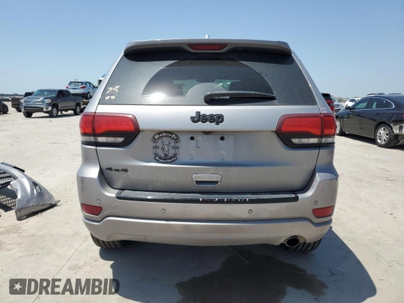 2018 Jeep Grand Cherokee Laredo with VIN 1C4RJFAG4JC272683, listed as a Copart auction lot 56823455 with 122,778 mi miles and Salvage title. Bid and sale history available at DreamBid. Image 6.