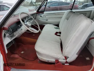 1966 Cadillac DeVille z VIN F6287812, wystawiony jako Copart lot #76001014 z przebiegiem 83 176 mil mil oraz Czysty tytuł • Clean title. Historia ofert i sprzedaży dostępna na DreamBid. Obrazek 7.