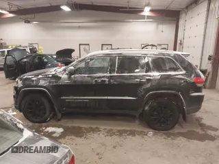 2016 Jeep Grand Cherokee Laredo with VIN 1C4RJFAGXGC311561, listed as a IAAI auction lot 41364024 with 134,042 mi miles. Bid and sale history available at carsss.com. Image 14.