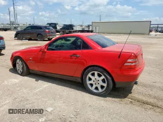 2000 Mercedes-Benz SLK 230 Kompressor with VIN WDBKK47F2YF156715, listed as a Copart auction lot 63873805 with 140,706 mi miles and Salvage title. Bid and sale history available at DreamBid. Image 2.
