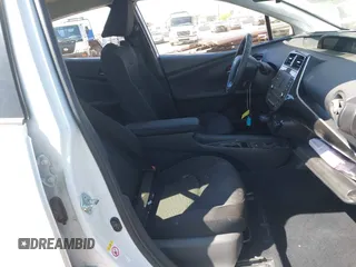 2022 Toyota Prius L Eco with VIN JTDKAMFUXN3181752, listed as a IAAI auction lot 42015717 with 129,637 mi miles and . Bid and sale history available at DreamBid. Image 5.