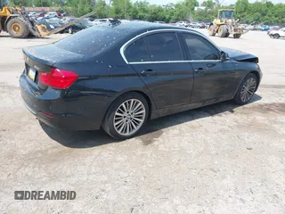 2015 BMW 3 Series 328i xDrive with VIN WBA3B3C57FF546250, listed as a IAAI auction lot 42214349 with 55,157 mi miles and . Bid and sale history available at DreamBid. Image 4.