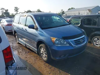 2010 Honda Odyssey EX-L z VIN 5FNRL3H79AB052697, wystawiony jako IAAI lot #42738006 z przebiegiem 178 717 mil mil oraz . Historia ofert i sprzedaży dostępna na DreamBid. Obrazek 1.