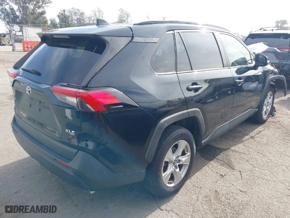 2019 Toyota RAV4 XLE with VIN JTMW1RFV0KD513744, listed as a IAAI auction lot 41252666 with NaN miles. Bid and sale history available at carsss.com. Image 4.