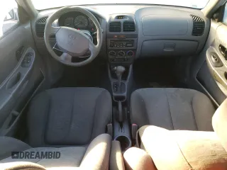 2004 Hyundai Accent GL with VIN KMHCG35C44U284868, listed as a Copart auction lot 74054884 with 87,259 mi miles and Clean Title. Bid and sale history available at carsss.com. Image 8.