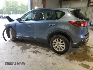 2016 Mazda CX-5 Sport z VIN JM3KE4BY0G0628372, wystawiony jako Copart lot #57534785 z przebiegiem 152 487 mil mil oraz Szkoda całkowita • Salvage title. Historia ofert i sprzedaży dostępna na DreamBid. Obrazek 2.