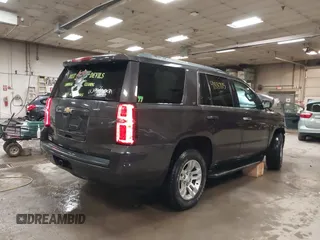 2015 Chevrolet Tahoe LT z VIN 1GNSKBKC1FR111299, wystawiony jako IAAI lot #41887115 z przebiegiem 157 666 mil mil oraz . Historia ofert i sprzedaży dostępna na DreamBid. Obrazek 4.