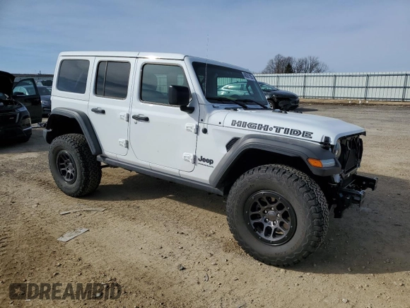 2023 Jeep Wrangler Sport S with VIN 1C4HJXDGXPW665818, listed as a Copart auction lot 48357105 with 9,803 mi miles and Clean Title. Bid and sale history available at DreamBid. Image 4.