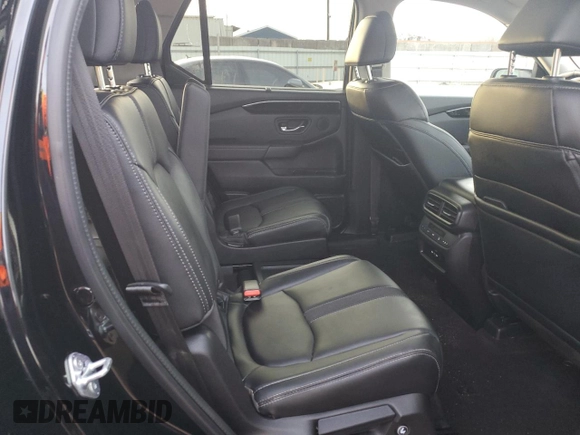 2024 Honda Pilot EX-L 7 Passenger with VIN 5FNYG1H51RB019899, listed as a Copart auction lot 82653994 with 7,399 mi miles and Salvage Title. Bid and sale history available at carsss.com. Image 11.