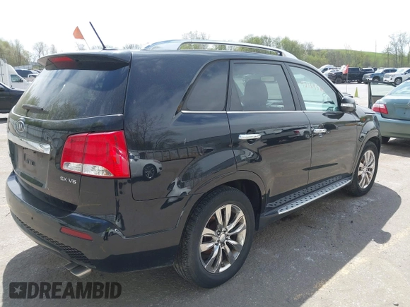 2013 Kia Sorento SX with VIN 5XYKWDA26DG338145, listed as a IAAI auction lot 42159587 with 84,283 mi miles. Bid and sale history available at carsss.com. Image 4.