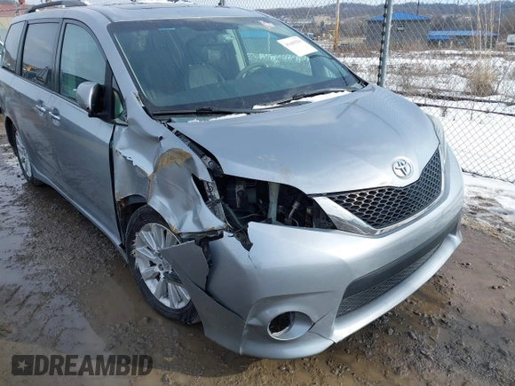 2013 Toyota Sienna SE with VIN 5TDXK3DC0DS354540, listed as a IAAI auction lot 41445501 with 238,814 mi miles and . Bid and sale history available at DreamBid. Image 6.