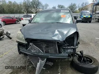 2005 Honda Odyssey EX-L with VIN 5FNRL38645B049087, listed as a Copart auction lot 56891275 with 194,587 mi miles and Salvage title. Bid and sale history available at DreamBid. Image 14.
