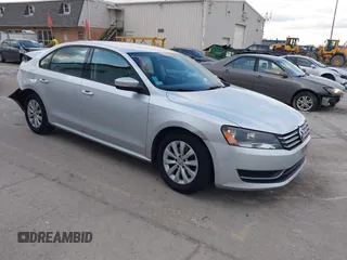 2015 Volkswagen Passat 1.8T Limited Edition with VIN 1VWAT7A31FC043053, listed as a IAAI auction lot 41241394 with 200,687 mi miles. Bid and sale history available at carsss.com. Image 1.