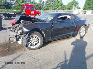 2015 Chevrolet Camaro LS z VIN 2G1FB1E3XF9249149, wystawiony jako IAAI lot #42157356 z przebiegiem 160 920 mil mil oraz . Historia ofert i sprzedaży dostępna na DreamBid. Obrazek 2.