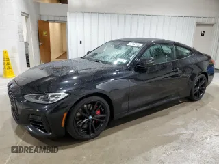 2021 BMW 4 Series M440i xDrive with VIN WBA13AR0XMCG68638, listed as a Copart auction lot 52142695 with 57,299 mi miles and Salvage Title. Bid and sale history available at DreamBid. Image 1.