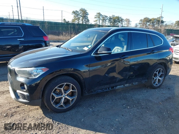 2018 BMW X1 xDrive28i with VIN WBXHT3C36J5L29746, listed as a IAAI auction lot 41547100 with 103,420 mi miles and . Bid and sale history available at DreamBid. Image 2.