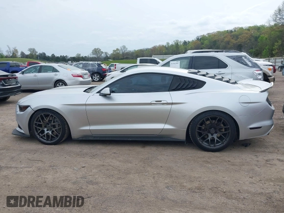 2015 Ford Mustang EcoBoost with VIN 1FA6P8TH9F5373917, listed as a IAAI auction lot 41932118 with 70,541 mi miles and . Bid and sale history available at carsss.com. Image 14.