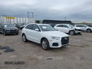 2017 Audi Q3 Premium z VIN WA1ECCFS7HR007729, wystawiony jako IAAI lot #42066580 z przebiegiem 116 460 mil mil oraz . Historia ofert i sprzedaży dostępna na DreamBid. Obrazek 1.
