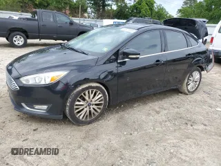 2018 Ford Focus Titanium с VIN 1FADP3J27JL294744, выставлен на аукционе Copart как лот 57827055 с пробегом 95 882 миль миль и Чистый • Clean title. История ставок и продаж доступна на DreamBid. Изображение 1.