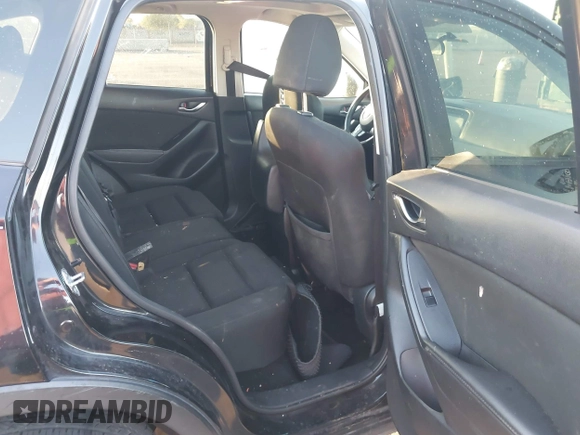 2016 Mazda CX-5 Touring with VIN JM3KE2CY5G0704574, listed as a IAAI auction lot 41033546 with 133,502 mi miles. Bid and sale history available at carsss.com. Image 8.