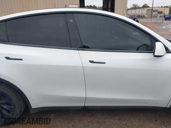 2021 Tesla Model Y Standard Range with VIN 5YJYGDED8MF114076, listed as a IAAI auction lot 41567295 with 150,133 mi miles and . Bid and sale history available at DreamBid. Image 12.