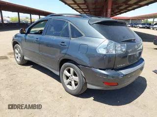 2004 Lexus RX 330 with VIN JTJGA31U340001595, listed as a IAAI auction lot 42125099 with 238,834 mi miles. Bid and sale history available at carsss.com. Image 3.