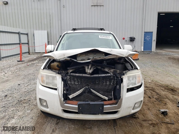 2011 Mercury Mariner Premier with VIN 4M2CN9HG4BKJ00933, listed as a Copart auction lot 85493024 with 208,764 mi miles and Salvage Title. Bid and sale history available at carsss.com. Image 5.