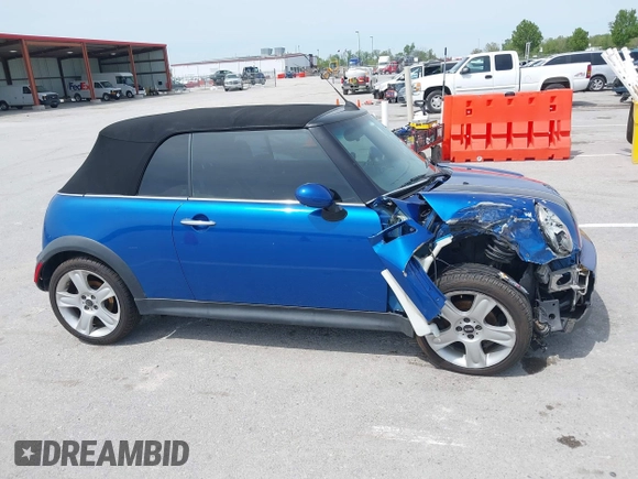 2006 MINI Convertible S with VIN WMWRH335X6TK59110, listed as a IAAI auction lot 42089085 with 101,303 mi miles and . Bid and sale history available at DreamBid. Image 13.