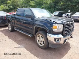 2015 GMC Sierra 2500HD SLT with VIN 1GT12ZEG5FF649131, listed as a IAAI auction lot 42642270 with 188,950 mi miles and . Bid and sale history available at DreamBid. Image 1.