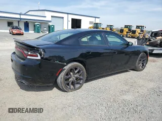 2019 Dodge Charger SXT with VIN 2C3CDXBG0KH553285, listed as a Copart auction lot 49739755 with 80,893 mi miles and Salvage Title. Bid and sale history available at carsss.com. Image 3.