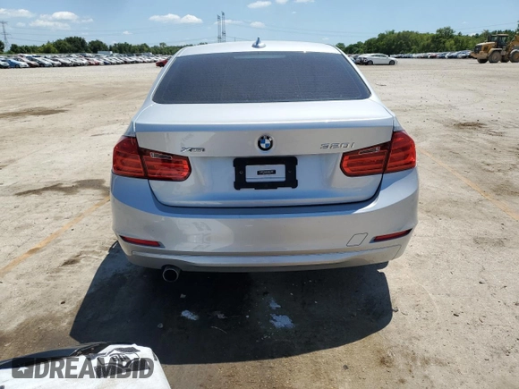 2014 BMW 3 Series 320i xDrive с VIN WBA3C3C58EP662305, выставлен на аукционе Copart как лот 62811895 с пробегом 43 793 миль миль и Списание • Salvage title. История ставок и продаж доступна на DreamBid. Изображение 6.