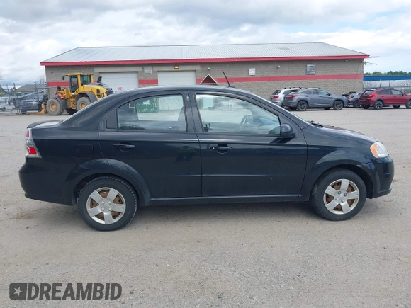 2011 Chevrolet Aveo 1LT z VIN KL1TD5DE9BB203861, wystawiony jako IAAI lot #42224197 z przebiegiem 126 327 mil mil oraz . Historia ofert i sprzedaży dostępna na DreamBid. Obrazek 14.