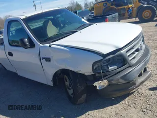 2003 Ford F-150 XL with VIN 2FTRF17W03CA59388, listed as a IAAI auction lot 41673651 with 221,668 mi miles. Bid and sale history available at carsss.com. Image 13.