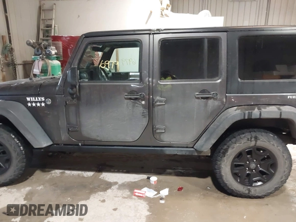 2016 Jeep Wrangler Unlimited Sport with VIN 1C4BJWDG2GL210060, listed as a IAAI auction lot 41546979 with 13,542 mi miles and . Bid and sale history available at DreamBid. Image 14.