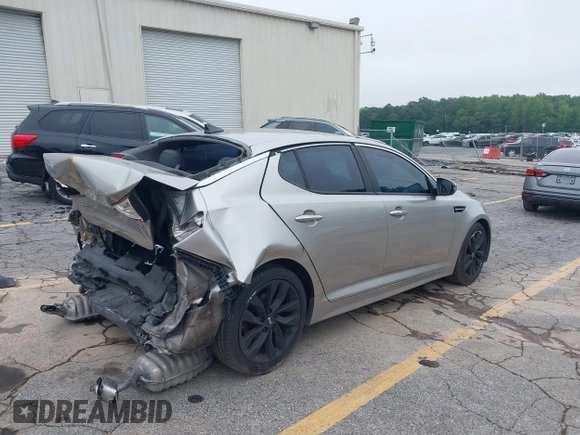 2015 Kia Optima SX with VIN 5XXGR4A73FG372494, listed as a IAAI auction lot 42345043 with 196,911 mi miles and . Bid and sale history available at DreamBid. Image 4.