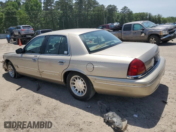 1999 Ford Crown Victoria LX z VIN 2FAFP74W1XX122364, wystawiony jako Copart lot #56929455 z przebiegiem 118 134 mil mil oraz Szkody całkowita. Historia ofert i sprzedaży dostępna na DreamBid. Obrazek 2.