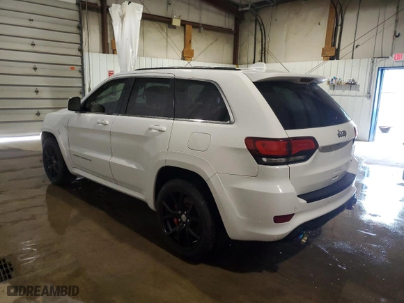 2015 Jeep Grand Cherokee SRT with VIN 1C4RJFDJ9FC237930, listed as a Copart auction lot 63540384 with 126,606 mi miles and Salvage Title. Bid and sale history available at carsss.com. Image 2.
