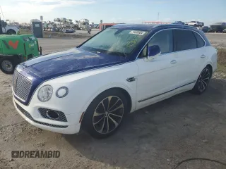 2019 Bentley Bentayga V8 z VIN SJAAM2ZV6KC026009, wystawiony jako Copart lot #74830884 z przebiegiem Nie podano mil oraz Nie do naprawy. Historia ofert i sprzedaży dostępna na DreamBid. Obrazek 1.