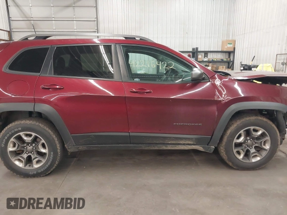 2019 Jeep Cherokee Trailhawk with VIN 1C4PJMBX7KD200267, listed as a IAAI auction lot 42216422 with Not provided miles and . Bid and sale history available at DreamBid. Image 14.