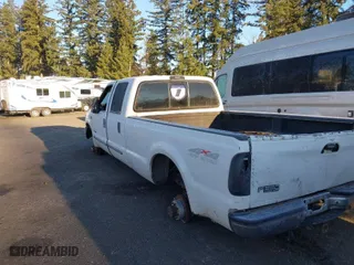 1999 Ford Super Duty F-350 SRW XL with VIN 1FTSW31F0XEE53396, listed as a IAAI auction lot 41383093 with 307,697 mi miles. Bid and sale history available at carsss.com. Image 3.