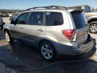 2010 Subaru Forester XT Limited with VIN JF2SH6FC4AH720430, listed as a Copart auction lot 82917944 with 134,935 mi miles and Salvage title. Bid and sale history available at DreamBid. Image 2.