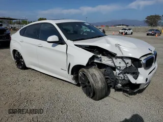 2017 BMW X6 sDrive35i z VIN 5UXKU0C36H0G68031, wystawiony jako Copart lot #52830915 z przebiegiem 67 224 mil mil oraz Szkoda całkowita • Salvage title. Historia ofert i sprzedaży dostępna na DreamBid. Obrazek 4.