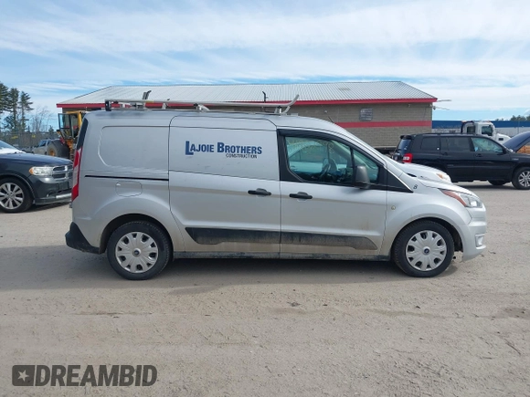 2019 Ford Transit Connect XLT z VIN NM0LS7F25K1410117, wystawiony jako IAAI lot #41902998 z przebiegiem 80 075 mil mil oraz . Historia ofert i sprzedaży dostępna na DreamBid. Obrazek 13.
