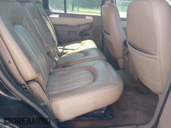 2003 Mercury Mountaineer Convenience z VIN 4M2DU86K43ZJ10878, wystawiony jako IAAI lot #42390874 z przebiegiem 194 867 mil mil oraz . Historia ofert i sprzedaży dostępna na DreamBid. Obrazek 8.