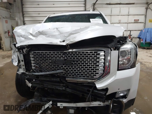 2016 GMC Yukon Denali with VIN 1GKS2CKJXGR271605, listed as a IAAI auction lot 41269124 with 172,432 mi miles. Bid and sale history available at carsss.com. Image 12.