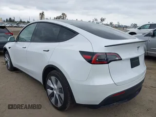 2024 Tesla Model Y with VIN 7SAYGDED4RF055859, listed as a IAAI auction lot 42201099 with 17,373 mi miles and . Bid and sale history available at DreamBid. Image 3.