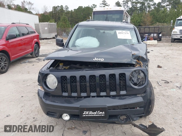 2014 Jeep Patriot Latitude with VIN 1C4NJRFB3ED551622, listed as a IAAI auction lot 40917179 with 109,856 mi miles. Bid and sale history available at carsss.com. Image 12.